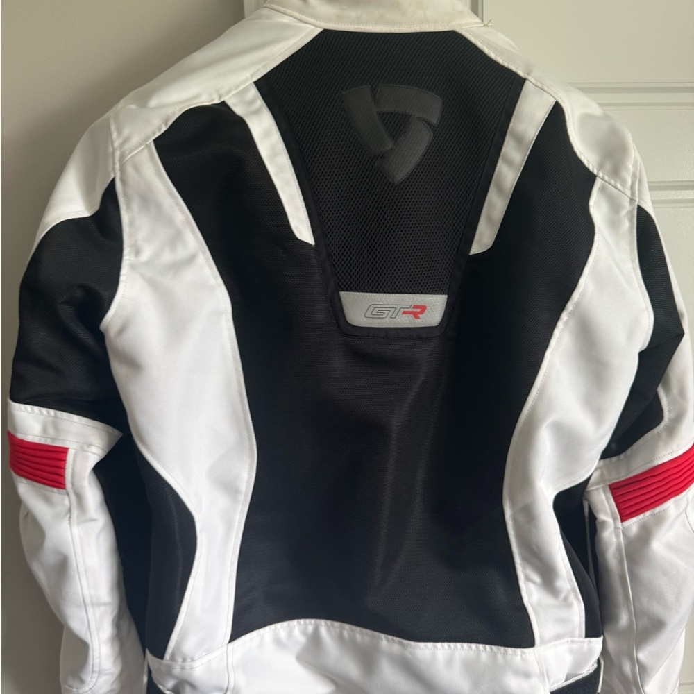 White and Black Motorcycle Jacket with Red Accents
